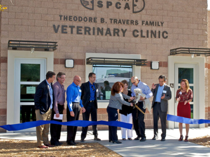 Ribbon cutting for opening of vet clinic in Oakland.